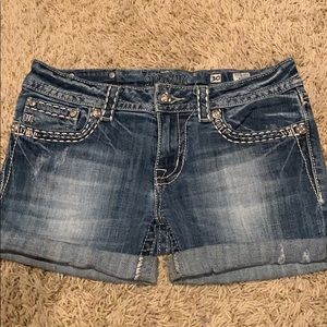 MISS ME: Mid-rise Jean cutoffs